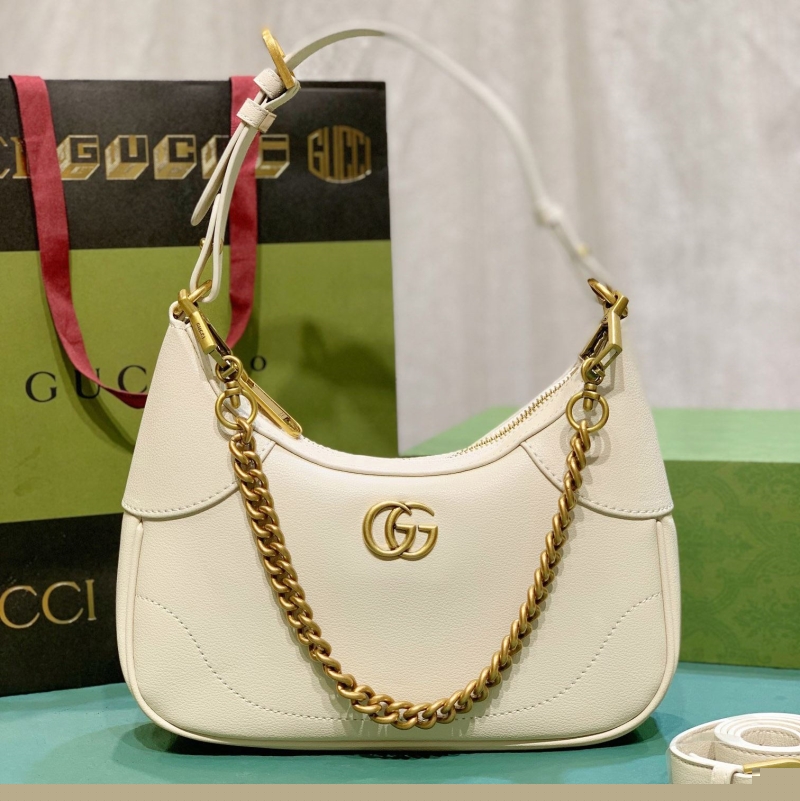 G*u*i top handle bags